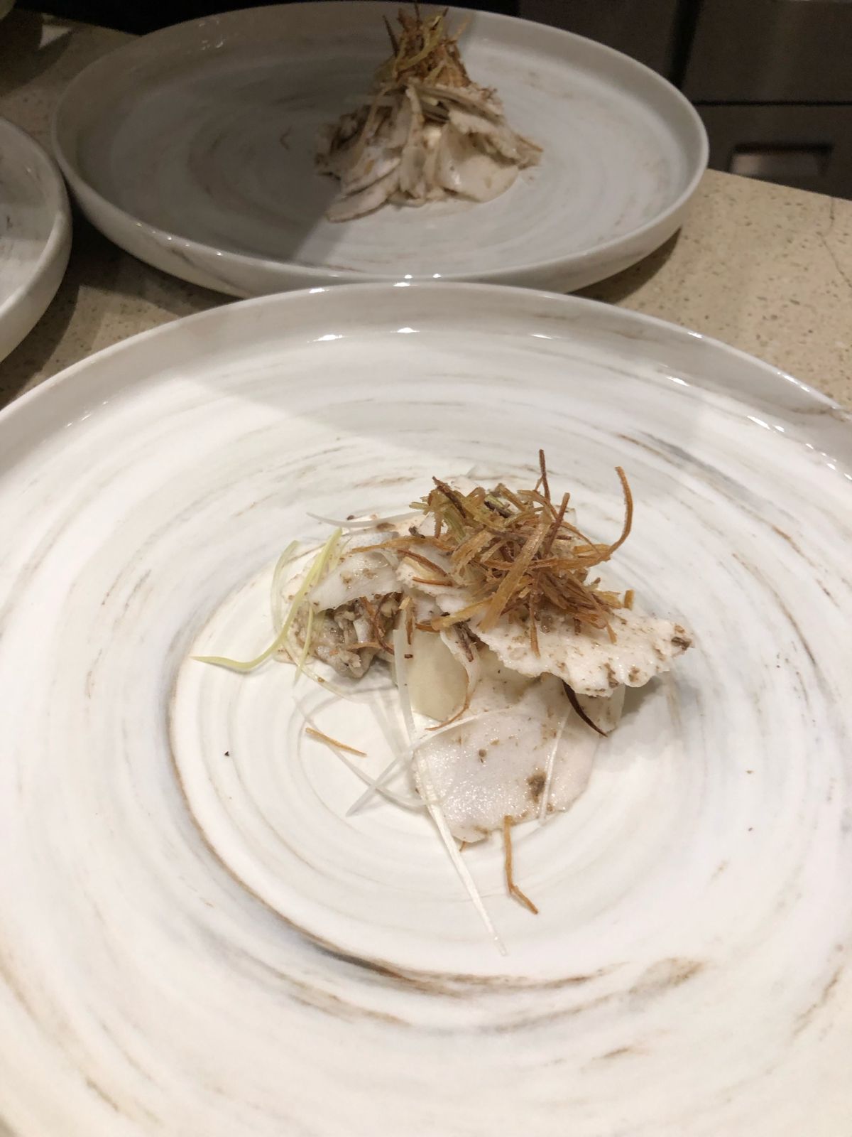 Delicately plated fish dish